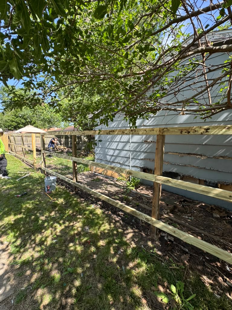 Fence installation crew at work