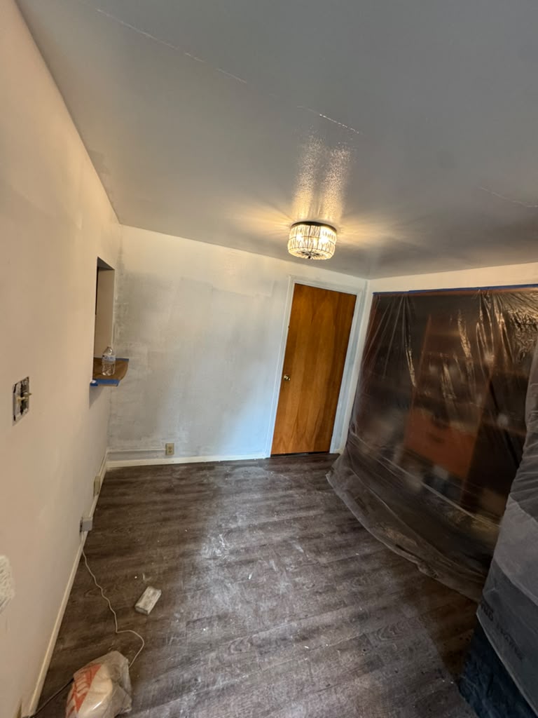 Interior room prepped and taped for painting