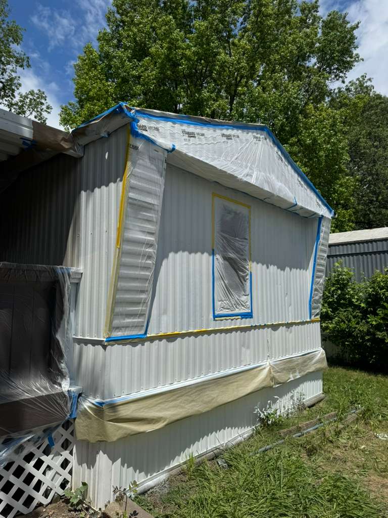 Mobile home exterior mid-project
